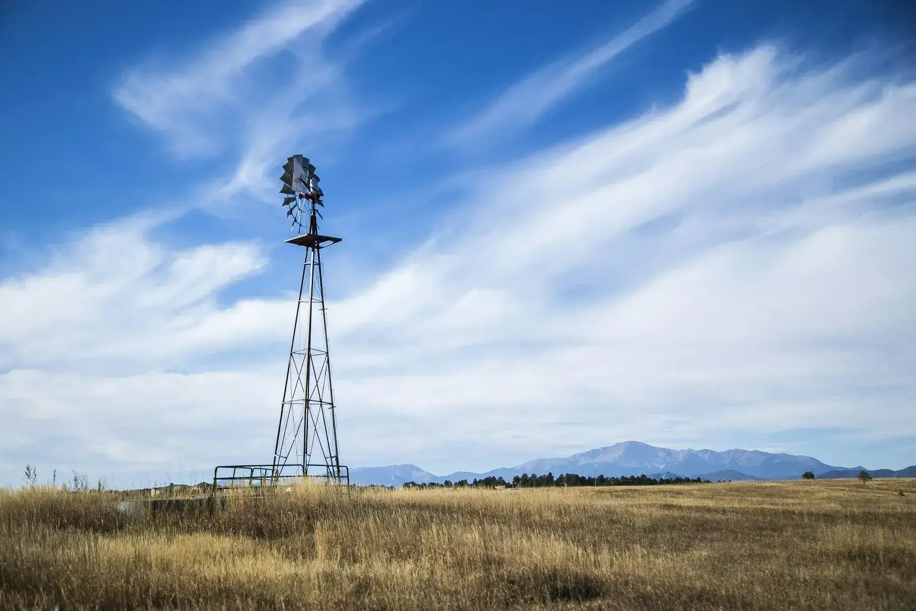Open plains of Elbert County with Pikes Peak in the distance